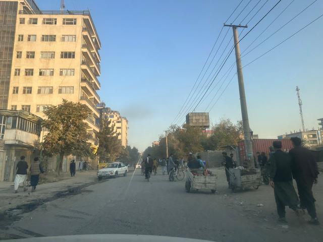 (251015) -- KABUL, Oct. 15, 2025 (Xinhua) -- Residents panic in a street after hearing an explosion in Kabul, the capital of Afghanistan, Oct. 15, 2025. A blast was heard in the Afghanistan capital Kabul at around 3 p.m. local time Wednesday, causing panic among city residents. (Photo by Saifurahman Safi/Xinhua)
