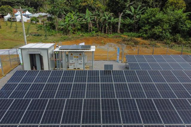 (251015) -- YAOUNDE, Oct. 15, 2025 (Xinhua) -- Aerial photo taken on Oct. 8, 2025 shows a solar power station in Songmimbias, in the Central Region of Cameroon. TO GO WITH "Zoom Africa: Solar panels light up African future" (Photo by Kepseu/Xinhua)