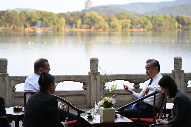 (251016) -- HANGZHOU, Oct. 16, 2025 (Xinhua) -- Wang Yi, a member of the Political Bureau of the Communist Party of China Central Committee and director of the Office of the Central Commission for Foreign Affairs, co-chairs the 27th China-France Strategic Dialogue with Emmanuel Bonne, diplomatic adviser to the French President, in Hangzhou, east China's Zhejiang Province, Oct. 15, 2025. (Xinhua/Dai Tianfang)