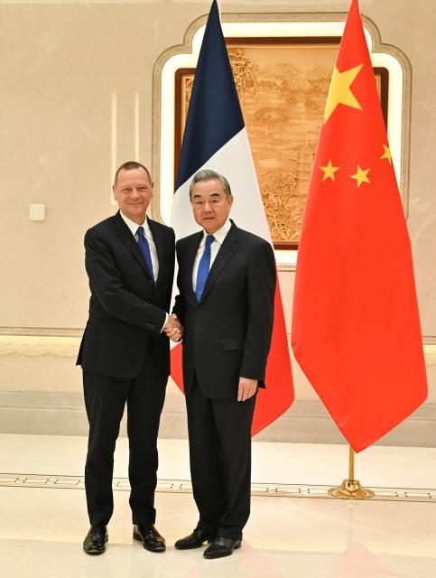 (251016) -- HANGZHOU, Oct. 16, 2025 (Xinhua) -- Wang Yi, a member of the Political Bureau of the Communist Party of China Central Committee and director of the Office of the Central Commission for Foreign Affairs, co-chairs the 27th China-France Strategic Dialogue with Emmanuel Bonne, diplomatic adviser to the French President, in Hangzhou, east China's Zhejiang Province, Oct. 15, 2025. (Xinhua/Dai Tianfang)