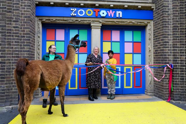 (251016) -- LONDON, Oct. 16, 2025 (Xinhua) -- Aneeshwar Kunchala, 10-year-old conservationist and "Mayor of ZooTown," attends the opening ceremony of ZooTown at London Zoo in London, Oct. 15, 2025.
  Opening to the public on Oct. 18, the ZooTown features multiple themed role-play stations where children can try their hands at working for wildlife, including preparing meals for animals in the Keeper Kitchen, fighting germs in the science lab or tracking wild animals in the field conservation station. (Xinhua)