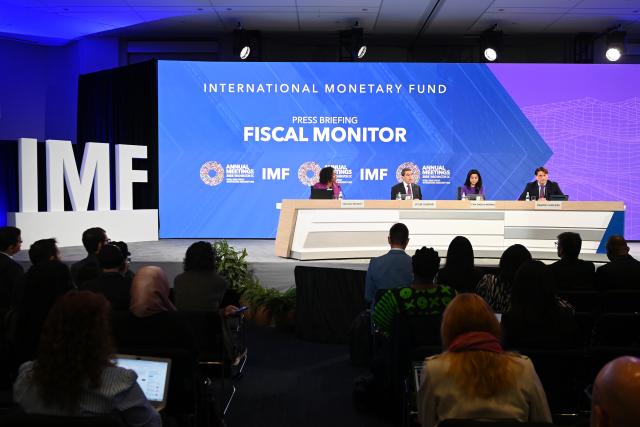 (251016) -- WASHINGTON, Oct. 16, 2025 (Xinhua) -- Vitor Gaspar (2nd L), outgoing director of the IMF's fiscal affairs department, speaks at a press briefing on Fiscal Monitor in Washington, D.C., the United States. In the latest Fiscal Monitor released Wednesday, the IMF argued that enhancing spending efficiency can magnify gains "substantially," and alleviate the fiscal policy trilemma. (Xinhua/Li Rui)