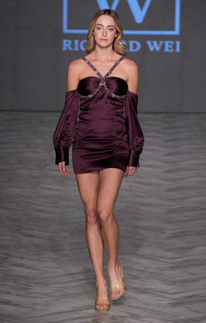 (251016) -- VANCOUVER, Oct. 16, 2025 (Xinhua) -- A model presents a creation of Richard Wei during the Spring/Summer 2026 Collections Fashion Show at Vancouver Fashion Week in Vancouver, British Columbia, Canada, Oct. 15, 2025. (Photo by Liang Sen/Xinhua)