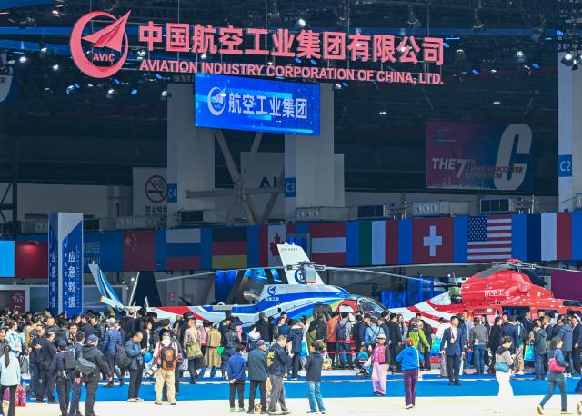 (251016) -- TIANJIN, Oct. 16, 2025 (Xinhua) -- People visit the 7th China Helicopter Exposition in Tianjin, north China, Oct. 16, 2025. Spanning an exhibition area of approximately 160,000 square meters, the exposition kicked off here on Thursday and will last until Oct. 19. (Xinhua/Sun Fanyue)