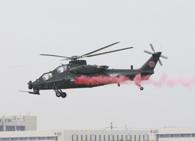 (251016) -- TIANJIN, Oct. 16, 2025 (Xinhua) -- A helicopter of Fenglei aerobatic team of the Chinese People's Liberation Army (PLA) performs during the opening ceremony of the 7th China Helicopter Exposition in north China's Tianjin Municipality, Oct. 16, 2025. Spanning an exhibition area of approximately 160,000 square meters, the exposition kicked off here on Thursday and will last until Oct. 19. (Xinhua/Liu Fang)