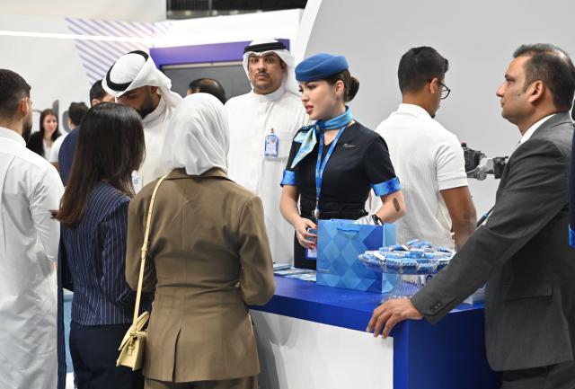 (251016) -- HAWALLI GOVERNORATE(KUWAIT), Oct. 16, 2025 (Xinhua) -- People visit the Watheefti career fair in Hawalli Governorate, Kuwait, Oct.16, 2025. The Watheefti career fair launched in Kuwait on Thursday with the participation of more than 80 entities from the public and private sectors. The job fair which lasts until Oct. 18 aims to provide job opportunities and provide a direct communication opportunity for Kuwaiti youth and job seekers. (Photo by Asad/Xinhua)