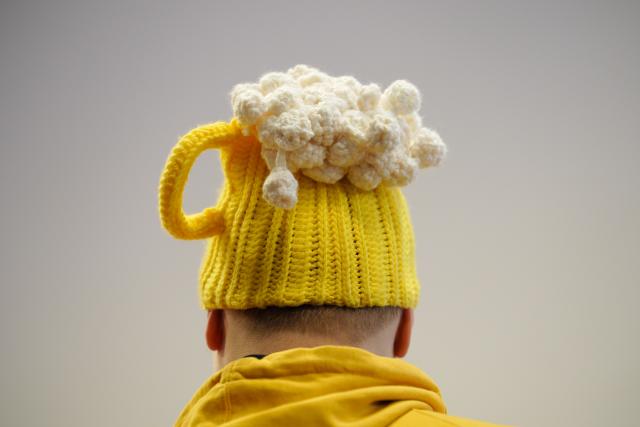 (251016) -- WARSAW, Oct. 16, 2025 (Xinhua) -- A man wears a beer mug-shaped hat at the 20th Warsaw Beer Festival in Warsaw, Poland, on Oct. 16, 2025. (Photo by Jaap Arriens/Xinhua)