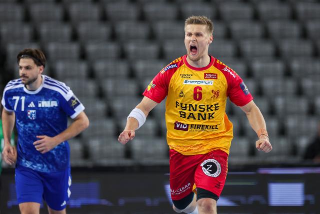 (251017) -- ZAGREB, Oct. 17, 2025 (Xinhua) -- Frederik Friche Bjerre (R) of GOG celebrates a goal during the EHF Champions League group B Round 5 match between HC Zagreb and GOG in Zagreb, Croatia, Oct. 16, 2025. (Photo by Goran Stanzl/PIXSELL via Xinhua)