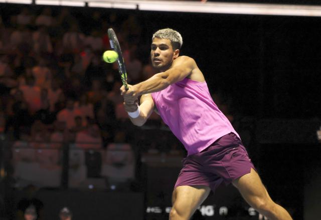 (251017) -- RIYADH, Oct. 17, 2025 (Xinhua) -- Carlos Alcaraz of Spain hits a return during the semifinal match against Taylor Fritz of the United States at the Six Kings Slam tennis tournament in Riyadh, Saudi Arabia, Oct. 16, 2025. (Xinhua/Luo Chen)