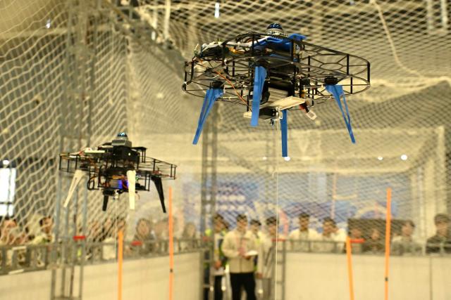 (251017) -- SHIJIAZHUANG, Oct. 17, 2025 (Xinhua) -- A drone challenge competition is held at the International Convention and Exhibition Center in Shijiazhuang, north China's Hebei Province, Oct. 17, 2025. The 2025 China Robot Competition and RoboCup China Open are held here from Friday to Sunday. (Photo by Chen Qibao/Xinhua)