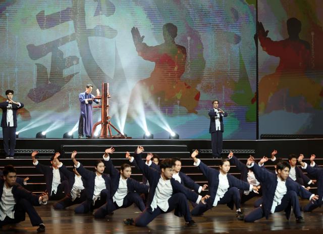 (251017) -- FOSHAN, Oct. 17, 2025 (Xinhua) -- A martial art performance is staged during the 13th China international folk art festival in Foshan, south China's Guangdong Province, Oct. 16, 2025. The folk art festival kicked off here on Thursday. (Xinhua/Huang Guobao)