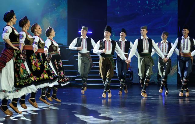 (251017) -- FOSHAN, Oct. 17, 2025 (Xinhua) -- A Serbian dance troupe performs during the 13th China international folk art festival in Foshan, south China's Guangdong Province, Oct. 16, 2025. The folk art festival kicked off here on Thursday. (Xinhua/Huang Guobao)