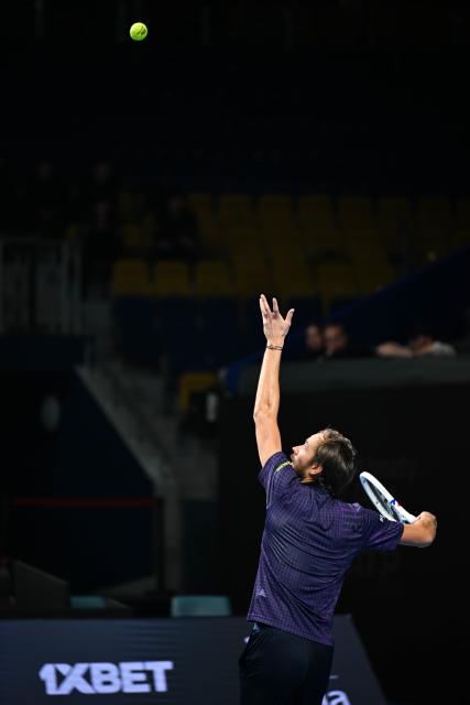 (251017) -- ALMATY, Oct. 17, 2025 (Xinhua) -- Daniil Medvedev of Russia serves during the men's singles quarterfinal match against Fabian Marozsan of Hungary at the ATP250 Almaty Tennis Open in Almaty, Kazakhstan, on Oct. 17, 2025. (Xinhua/Li Renzi)