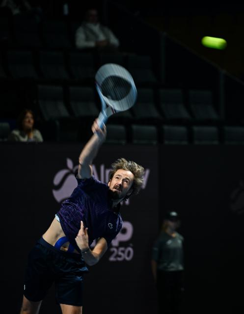 (251017) -- ALMATY, Oct. 17, 2025 (Xinhua) -- Daniil Medvedev of Russia serves during the men's singles quarterfinal match against Fabian Marozsan of Hungary at the ATP250 Almaty Tennis Open in Almaty, Kazakhstan, on Oct. 17, 2025. (Xinhua/Li Renzi)