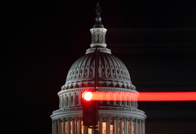 (251017) -- WASHINGTON, Oct. 17, 2025 (Xinhua) -- This long-exposure photo taken on Oct. 15, 2025 shows the U.S. Capitol building in Washington, D.C., the United States. TO GO WITH "World Insights: U.S. gov't shutdown could turn into a protracted standoff" (Xinhua/Li Rui)
