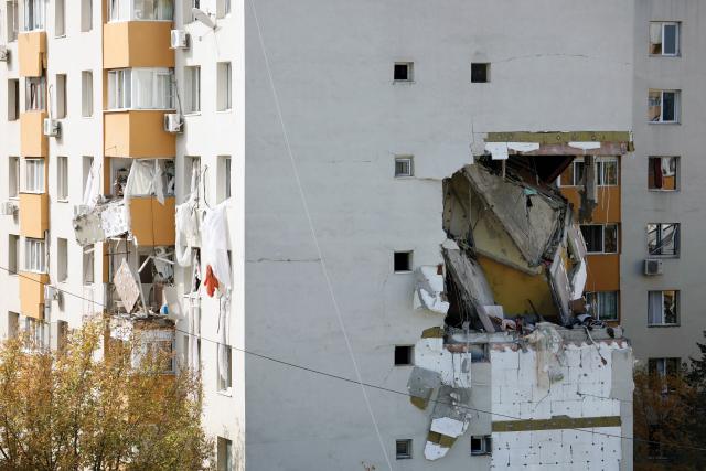 (251018) -- BEIJING, Oct. 18, 2025 (Xinhua) -- An apartment block hit by a gas explosion is pictured in Bucharest, Romania, Oct. 17, 2025. Three people were killed and at least 13 others injured after an explosion ripped through an apartment block in the Romanian capital here on Friday, authorities said. (Photo by Cristian Cristel/Xinhua)
