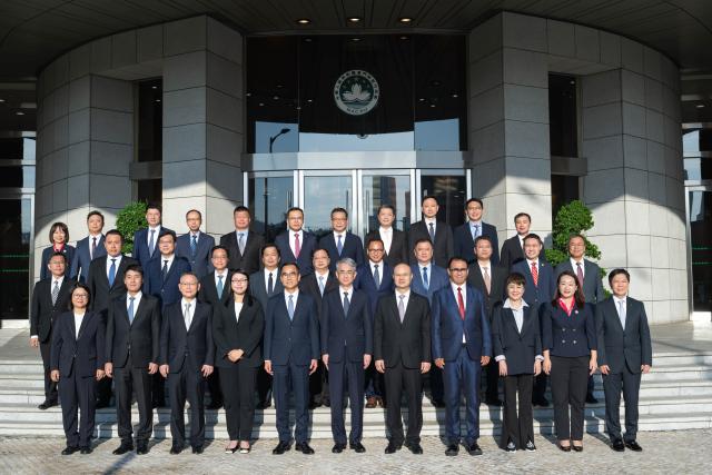 (251018) -- BEIJING, Oct. 18, 2025 (Xinhua) -- Members of the eighth Legislative Assembly of the Macao Special Administrative Region (SAR) pose for a group photo in south China's Macao, Oct. 16, 2025. (Xinhua/Cheong Kam Ka)