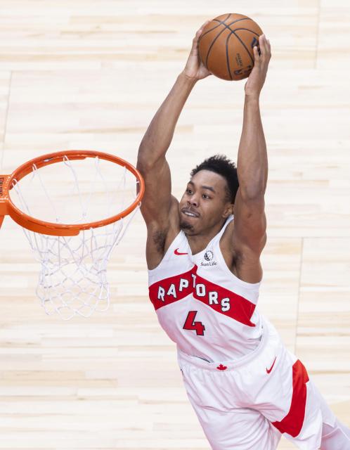 (251018) -- TORONTO, Oct. 18, 2025 (Xinhua) -- Scottie Barnes of Toronto Raptors dunks during the 2025-2026 NBA preseason game between Toronto Raptors and Brooklyn Nets in Toronto, Canada, on Oct. 17, 2025. (Photo by Zou Zheng/Xinhua)