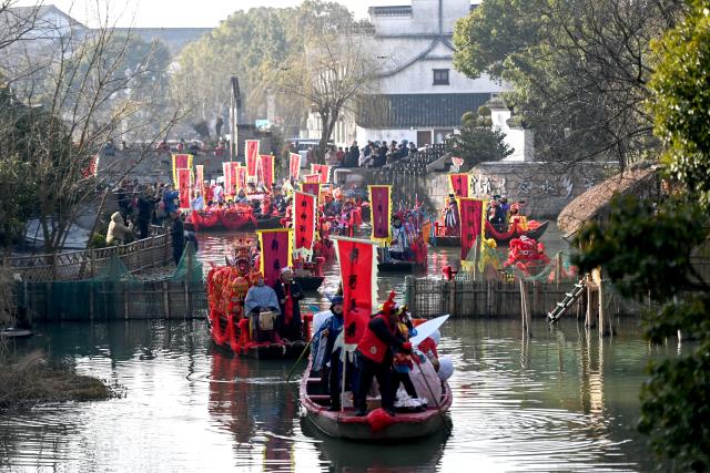 (251018) -- BEIJING, Oct. 18, 2025 (Xinhua) -- This photo taken on Jan. 26, 2023 shows fishing boats taking part in a parade on an ancient waterway in Digang Village of Huzhou City, east China's Zhejiang Province. Four Chinese villages were listed in the UN Tourism's 2025 edition of "Best Tourism Villages," according to announcements made at a UN Tourism awards ceremony on Friday in Huzhou, east China's Zhejiang Province.
   The four listed villages are Huanggang in the Qiandongnan Miao and Dong Autonomous Prefecture, southwest China's Guizhou Province; Jikayi in the Ganzi Tibetan Autonomous Prefecture, southwest China's Sichuan Province; Dongluo, which is administered by Taizhou City in east China's Jiangsu Province; and Digang, which is administered by Huzhou City in Zhejiang Province.
    With these four villages, China now boasts a total of 19 "Best Tourism Villages" as recognized by the UN Tourism, with 15 other Chinese villages listed over previous years. (Xinhua/Huang Zongzhi)