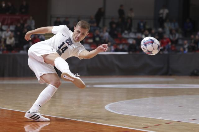(251018) -- LJUBLJANA, Oct. 18, 2025 (Xinhua) -- Matej Fidersek of Slovenia shoots during a friendly match before the UEFA Futsal Euro2026 between Slovenia and Croatia in Ljubljana, Slovenia, Oct. 17, 2025. (Photo by Zeljko Stevanic/Xinhua)