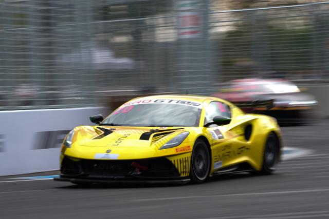 (251018) -- BEIJING, Oct. 18, 2025 (Xinhua) -- Team Pegasus' Chinese driver Lu Wenlong competes during the pre-qualifying session of SRO GT Cup at the Beijing Street Circuit in Beijing Economic-Technological Development Area (E-Town) of Beijing, China, Oct. 18, 2025. (Xinhua/Zheng Huansong)