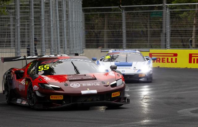 (251018) -- BEIJING, Oct. 18, 2025 (Xinhua) -- Winhere Harmony Racing team driver Zhang Yaqi/Ye Yifei of China (front) and teammate driver Luo Kailuo/Deng Yi of China compete during the qualifying session of GT World Challenge Asia at the Beijing Street Circuit in Beijing Economic-Technological Development Area (E-Town) of Beijing, China, Oct. 18, 2025. (Xinhua/Liu Mengqi)