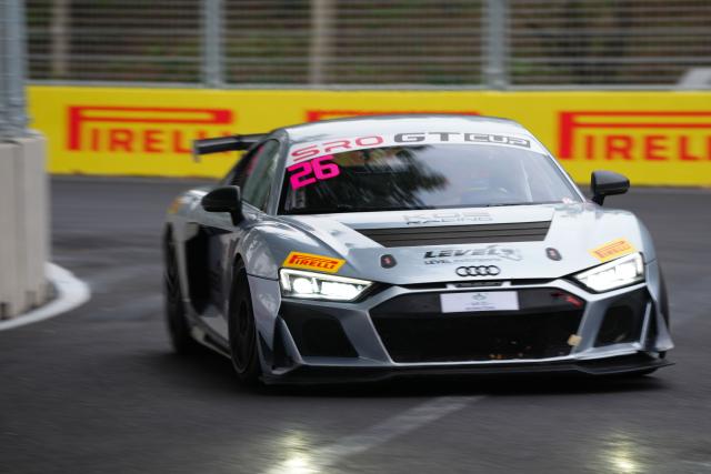 (251018) -- BEIJING, Oct. 18, 2025 (Xinhua) -- Level Motorsports' driver Chuang Chi Shun of Chinese Taipei competes during the qualifying session of SRO GT Cup at the Beijing Street Circuit in Beijing Economic-Technological Development Area (E-Town) of Beijing, China, Oct. 18, 2025. (Xinhua/Zheng Huansong)