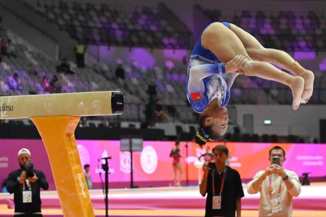 (251018) -- JAKARTA, Oct. 18, 2025 (Xinhua) -- Zhang Qingying of China practices on the balance beam as preparation of the 53rd FIG Artistic Gymnastics World Championships in Jakarta, Indonesia, Oct. 18, 2025. The 53rd FIG Artistic Gymnastics World Championships are being held in Jakarta, Indonesia, from Oct. 19 to Oct. 25, 2025. (Xinhua/Agung Kuncahya B.)