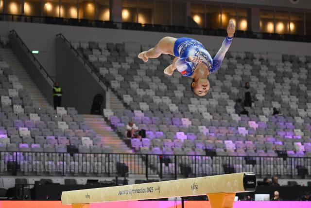 (251018) -- JAKARTA, Oct. 18, 2025 (Xinhua) -- Zhang Qingying of China practices on the balance beam as preparation of the 53rd FIG Artistic Gymnastics World Championships in Jakarta, Indonesia, Oct. 18, 2025. The 53rd FIG Artistic Gymnastics World Championships are being held in Jakarta, Indonesia, from Oct. 19 to Oct. 25, 2025. (Xinhua/Agung Kuncahya B.)