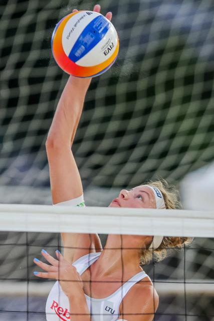 (251018) -- LAGUNA PROVINCE, Oct. 18, 2025 (Xinhua) -- Aine Raupelyte of Lithuania competes during the women's quarterfinal match between Anniina Parkkinen/Valma Vilhelmiina Prihti of Finland and Monika Paulikiene/Aine Raupelyte of Lithuania at the Volleyball World Beach Pro Tour in Laguna Province, the Philippines, Oct. 18, 2025. (Xinhua/Rouelle Umali)