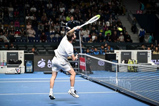 (251019) -- ALMATY, Oct. 19, 2025 (Xinhua) -- Corentin Moutet of France hits a return during the men's singles semifinal match against Alex Michelsen of the United States at the ATP 250 Almaty Tennis Open in Almaty, Kazakhstan, on Oct. 18, 2025. (Xinhua/Li Renzi)