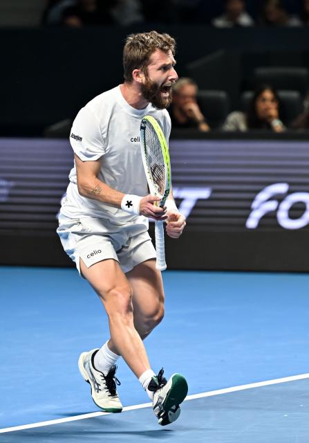 (251019) -- ALMATY, Oct. 19, 2025 (Xinhua) -- Corentin Moutet of France celebrates scoring during the men's singles semifinal match against Alex Michelsen of the United States at the ATP 250 Almaty Tennis Open in Almaty, Kazakhstan, on Oct. 18, 2025. (Xinhua/Li Renzi)