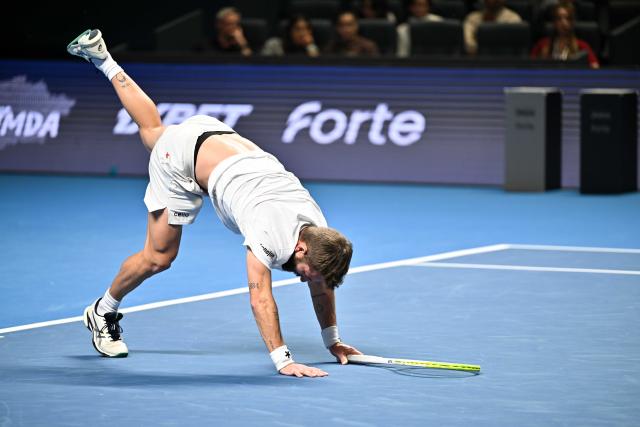 (251019) -- ALMATY, Oct. 19, 2025 (Xinhua) -- Corentin Moutet of France reacts during the men's singles semifinal match against Alex Michelsen of the United States at the ATP 250 Almaty Tennis Open in Almaty, Kazakhstan, on Oct. 18, 2025. (Xinhua/Li Renzi)