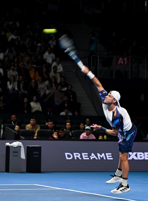 (251019) -- ALMATY, Oct. 19, 2025 (Xinhua) -- James Duckworth of Australia serves during the men's singles semifinal match against Daniil Medvedev of Russia at the ATP250 Almaty Tennis Open in Almaty, Kazakhstan, on Oct. 18, 2025. (Xinhua/Li Renzi)