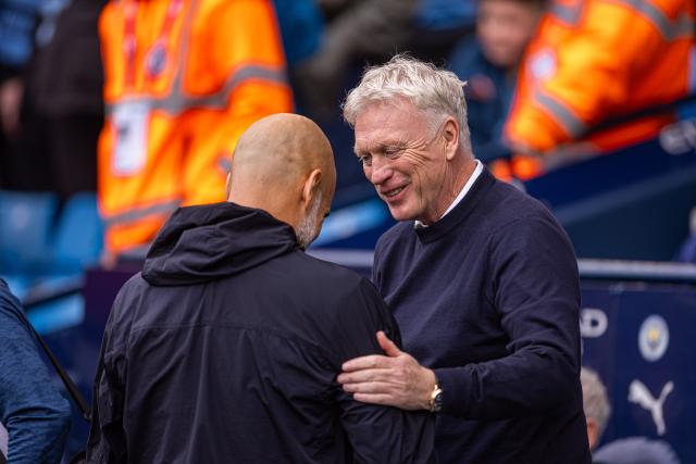 (251019) -- MANCHESTER, Oct. 19, 2025 (Xinhua) -- Everton's head coach David Moyes (R) speaks to Manchester City's head coach Pep Guardiola before the English Premier League match between Manchester City FC and Everton FC in Manchester, Britain, on Oct. 18, 2025. (Xinhua)
FOR EDITORIAL USE ONLY. NOT FOR SALE FOR MARKETING OR ADVERTISING CAMPAIGNS. NO USE WITH UNAUTHORIZED AUDIO, VIDEO, DATA, FIXTURE LISTS, CLUB/LEAGUE LOGOS OR "LIVE" SERVICES. ONLINE IN-MATCH USE LIMITED TO 45 IMAGES, NO VIDEO EMULATION. NO USE IN BETTING, GAMES OR SINGLE CLUB/LEAGUE/PLAYER PUBLICATIONS.