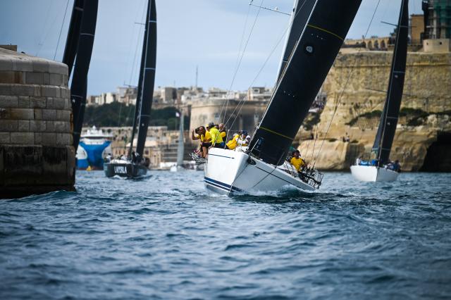 (251019) -- VALLETTA, Oct. 19, 2025 (Xinhua) -- Yachts compete during the 46th (2025) Rolex Middle Sea Race at the Grand Harbour in Valletta, Malta, Oct. 18, 2025. (Photo by Jonathan Borg/Xinhua)
