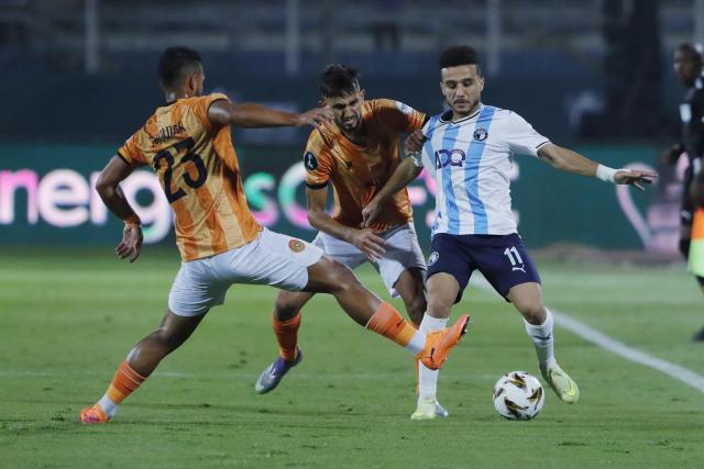 (251019) -- CAIRO, Oct. 19, 2025 (Xinhua) -- Mostafa Fathi (R) of Pyramids FC competes during the CAF (Confederation of African Football) Super Cup 2025 final match between Pyramids FC of Egypt and RS Berkane of Morocco in Cairo, Egypt, on Oct. 18, 2025. (Xinhua/Ahmed Gomaa)