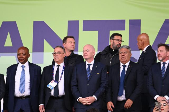 (251020) -- SANTIAGO, Oct. 20, 2025 (Xinhua) -- FIFA President Gianni Infantino (C front) is seen before the final match between Argentina and Morocco at the FIFA U-20 World Cup Chile 2025 in Santiago, Chile, Oct. 19, 2025. (Photo by Jorge Villegas/Xinhua)