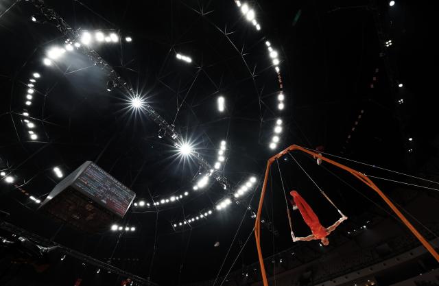 (251020) -- JAKARTA, Oct. 20, 2025 (Xinhua) -- Shi Cong of China competes during the Men's Rings Qualification at the 53rd FIG Artistic Gymnastics World Championships in Jakarta, Indonesia, on Oct. 20, 2025. (Xinhua/Bai Xuefei)
