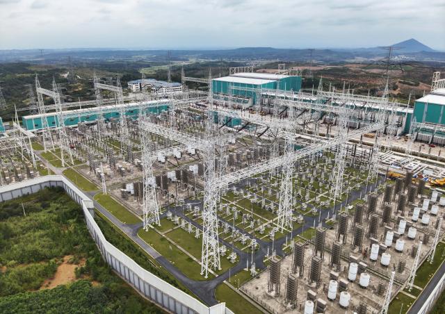(251020) -- XUANCHENG, Oct. 20, 2025 (Xinhua) -- An aerial drone photo shows the Guquan converter station in Xuncheng, east China's Anhui Province, Oct. 20, 2025. The Guquan converter station on the Changji-Guquan ultra-high voltage direct current (UHVDC) transmission line that transmits electricity from Xinjiang to east China is undergoing a 7-day annual overhaul started from Oct. 17.
   The Changji-Guquan transmission line, which was put into operation in September 2019, leads the world in terms of voltage level, transmission capacity and distance. (Photo by Zheng Xianlie/Xinhua)