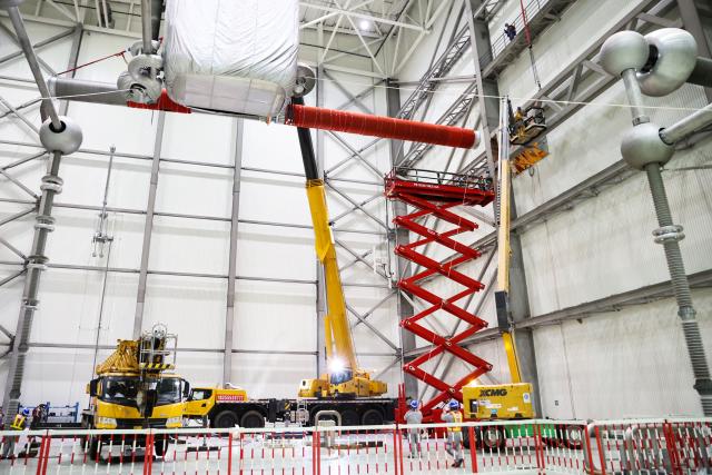 (251020) -- XUANCHENG, Oct. 20, 2025 (Xinhua) -- Staff members conduct maintenance work at the Guquan converter station in Xuncheng, east China's Anhui Province, Oct. 19, 2025. The Guquan converter station on the Changji-Guquan ultra-high voltage direct current (UHVDC) transmission line that transmits electricity from Xinjiang to east China is undergoing a 7-day annual overhaul started from Oct. 17.
   The Changji-Guquan transmission line, which was put into operation in September 2019, leads the world in terms of voltage level, transmission capacity and distance. (Photo by Zhao Xianfu/Xinhua)