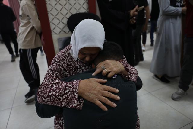 (251020) -- NABLUS, Oct. 20, 2025 (Xinhua) -- Relatives mourn over a Palestinian man who was killed by the Israeli army in the West Bank city of Nablus, on Oct. 19, 2025. A Palestinian man was killed by the Israeli army in Nablus, the Palestinian Health Ministry reported on Sunday. (Photo by Nidal Eshtayeh/Xinhua)