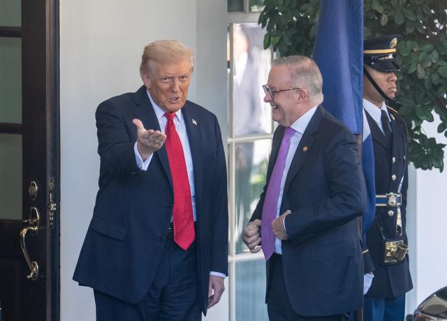 (251020) -- WASHINGTON, Oct. 20, 2025 (Xinhua) -- U.S. President Donald Trump (L) welcomes Australian Prime Minister Anthony Albanese at the White House in Washington, D.C., the United States, on Oct. 20, 2025. (Xinhua/Hu Yousong)