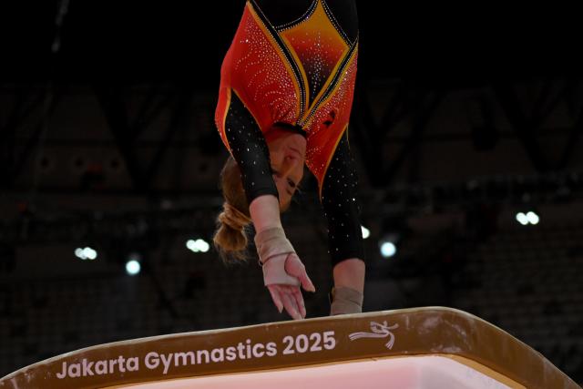 (251021) -- JAKARTA, Oct. 21, 2025 (Xinhua) -- Karina Schoenmaier of Germany practices before the Women's Vault  Qualification at the 53rd FIG Artistic Gymnastics World Championships in Jakarta, Indonesia, on Oct. 20, 2025. (Xinhua/Agung Kuncahya B.)