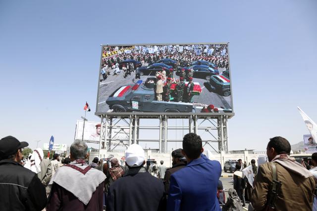 (251021) -- SANAA, Oct. 21, 2025 (Xinhua) -- People watch a big screen broadcasting the funeral of those who were killed in recent Israeli airstrikes in Sanaa, Yemen, Oct. 20, 2025.
  Yemen's Houthi group said in a statement on Oct. 16 that its Chief of Staff, Mohammed Abdulkarim al-Gumari, had been killed in recent Israeli airstrikes.
  The statement, broadcast by the Houthi-run satellite channel al-Masirah, said that several senior officers were also killed alongside him at the same location, but provided no further details. (Photo by Mohammed Mohammed/Xinhua)