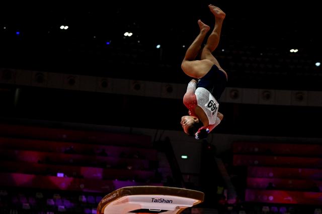 (251021) -- JAKARTA, Oct. 21, 2025 (Xinhua) -- Leanne Wong of the United States competes on the Women's Vault Qualification at the 53rd FIG World Artistic Gymnastics Championships at Indonesia Arena Stadium in Jakarta, Indonesia, Oct. 21, 2025. (Xinhua/Agung Kuncahya B.)