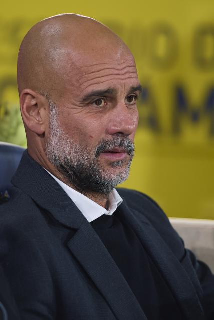 (251022) -- VILLARREAL, Oct. 22, 2025 (Xinhua) -- Pep Guardiola, head coach of Manchester City reacts during the Champions League football match between Manchester City and Villarreal CF in La Ceramica stadium, Villarreal, Spain, on October 21, 2025. (Xinhua/Stinger)