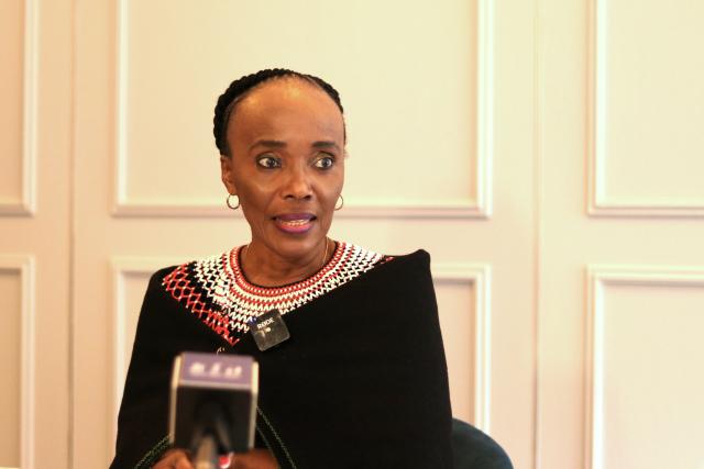 (251022) -- JOHANNESBURG, Oct. 22, 2025 (Xinhua) -- South African Minister in the Presidency for Women, Youth, and Persons with Disabilities Sindisiwe Chikunga speaks during an interview with Xinhua in Johannesburg, South Africa, Oct. 20, 2025. TO GO WITH "Interview: Global Leaders' Meeting on Women reaffirms commitment to women's empowerment: S. African minister" (Xinhua/Bai Ge)
