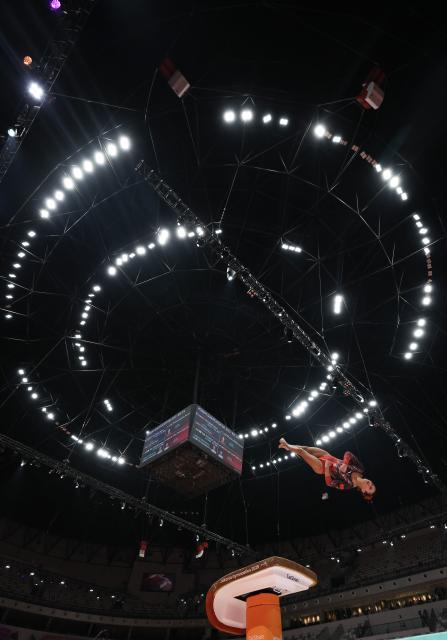 (251022) -- BEIJING, Oct. 22, 2025 (Xinhua) -- Deng Yalan of China competes during the Women's Vault Qualification at the 53rd FIG Artistic Gymnastics World Championships in Jakarta, Indonesia, on Oct. 21, 2025. (Xinhua/Bai Xuefei)