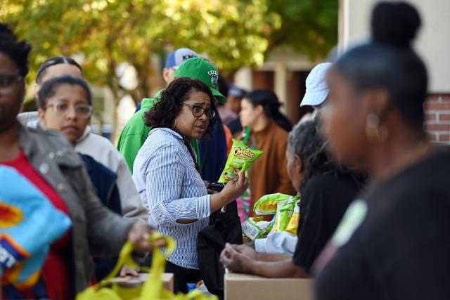 (251022) -- HYATTSVILLE, Oct. 22, 2025 (Xinhua) -- Federal employees and contractors receive food items during a free food distribution in Hyattsville, Maryland, the United States, on Oct. 21, 2025. Starting this week, the nonprofit Capital Area Food Bank started to provide special free food distributions to U.S. federal employees and contractors.
   Over the past weeks, the impact of the government shutdown has gradually become apparent. About 750,000 federal employees in so-called "non-essential" positions have been furloughed without pay, while hundreds of thousands in "essential" roles remain on the job -- also without pay.
   Against the backdrop of rising food prices and high mortgage costs, the inability to receive timely paychecks has placed significant financial pressure on many federal workers. (Xinhua/Li Rui)